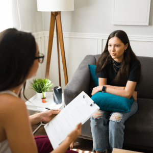 therapists for teens. picture of a teen receiving counseling services.