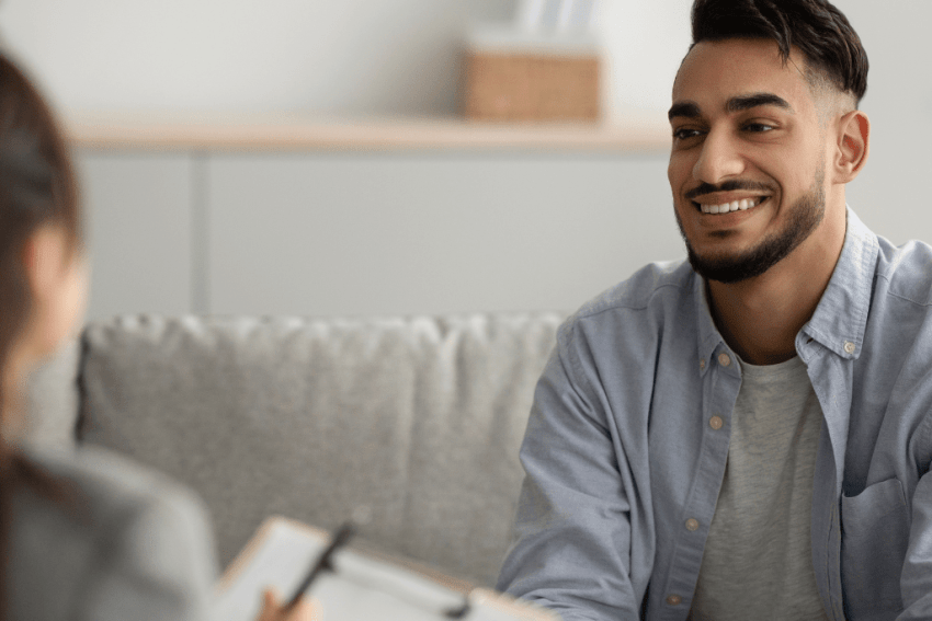 Therapy for Men in Utah. Man sitting down with his therapist.